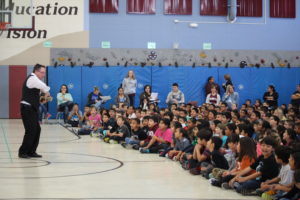 Students at school assembly 